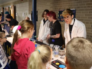 UM Astronomy Graduate Students at Outreach Event 